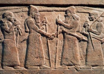 origem do aperto de mão