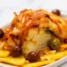 Bacalhau à Braga: receita tradicional minhota, truques e segredos para ficar perfeito