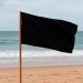 Bandeira negra na praia: o alerta máximo que todos devem conhecer