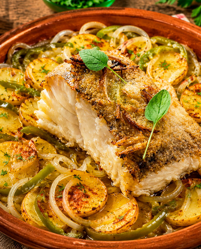 Bacalhau à Minhota: a receita tradicional do Minho que nunca desilude Bacalhau à Minhota tradicional