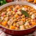 Frango guisado com grão-de-bico